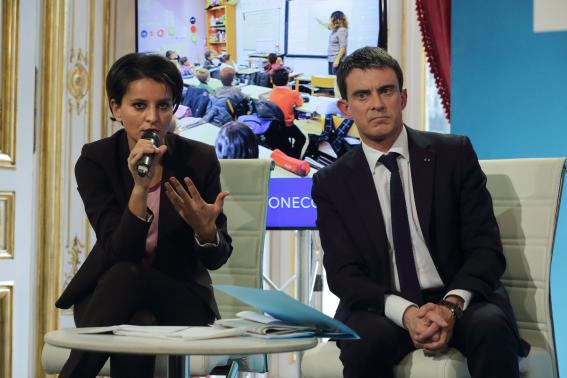 French Prime Minister Valls and Education and Research minister Vallaud-Belkacem attend a news conference in Pari